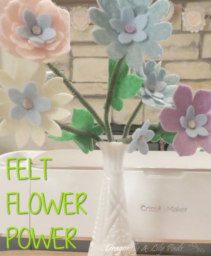 felt flowers on branches in a vase