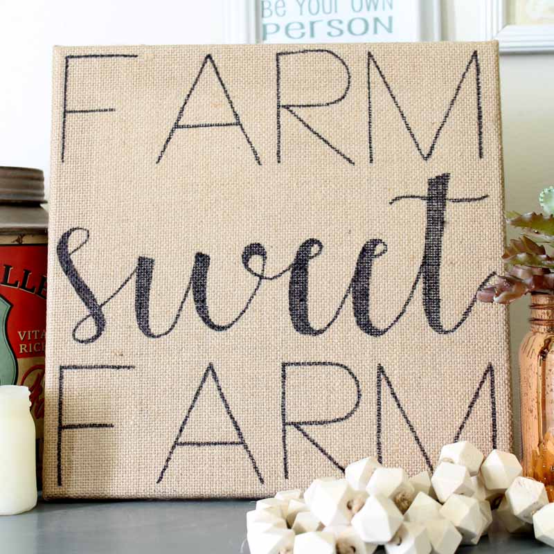 Make this farmhouse sign in minutes! Quick and easy way to turn burlap into art with a free template!
