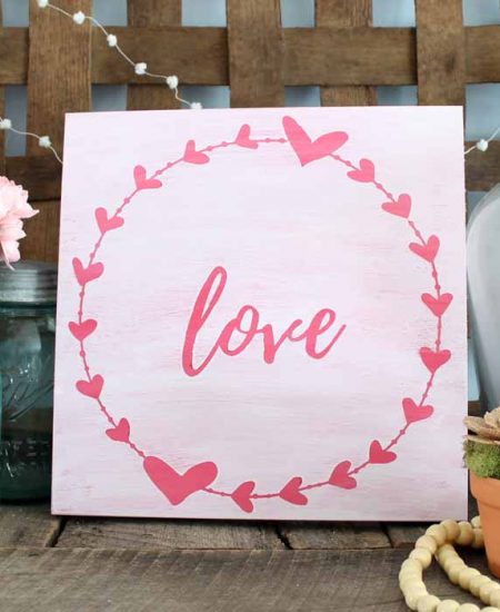 rustic love art on a farmhouse style mantel