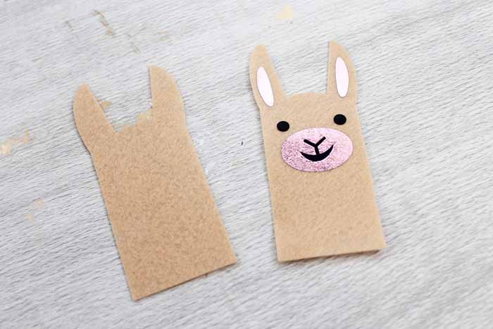 front and back llama finger puppet pieces with vinyl attached