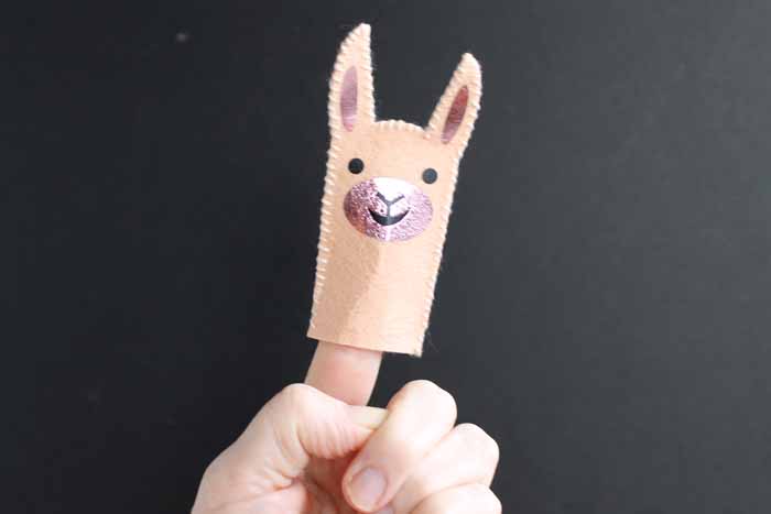 Make this smiling llama finger puppet for your little one with this quick and easy project using your Cricut machine!