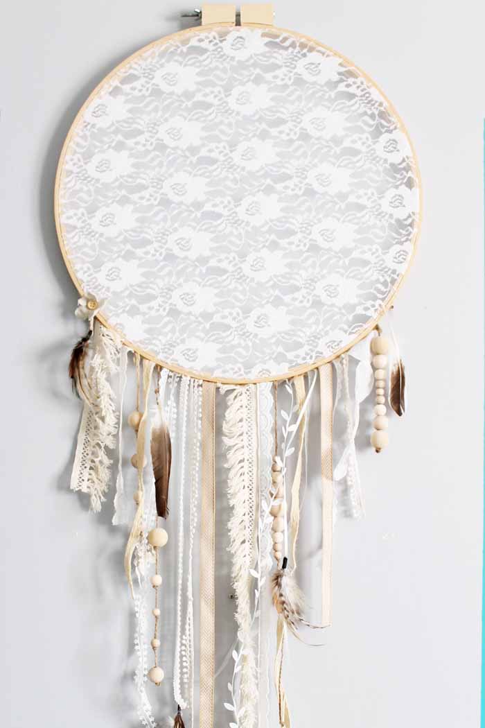ribbons and beads on an embroidery hoop