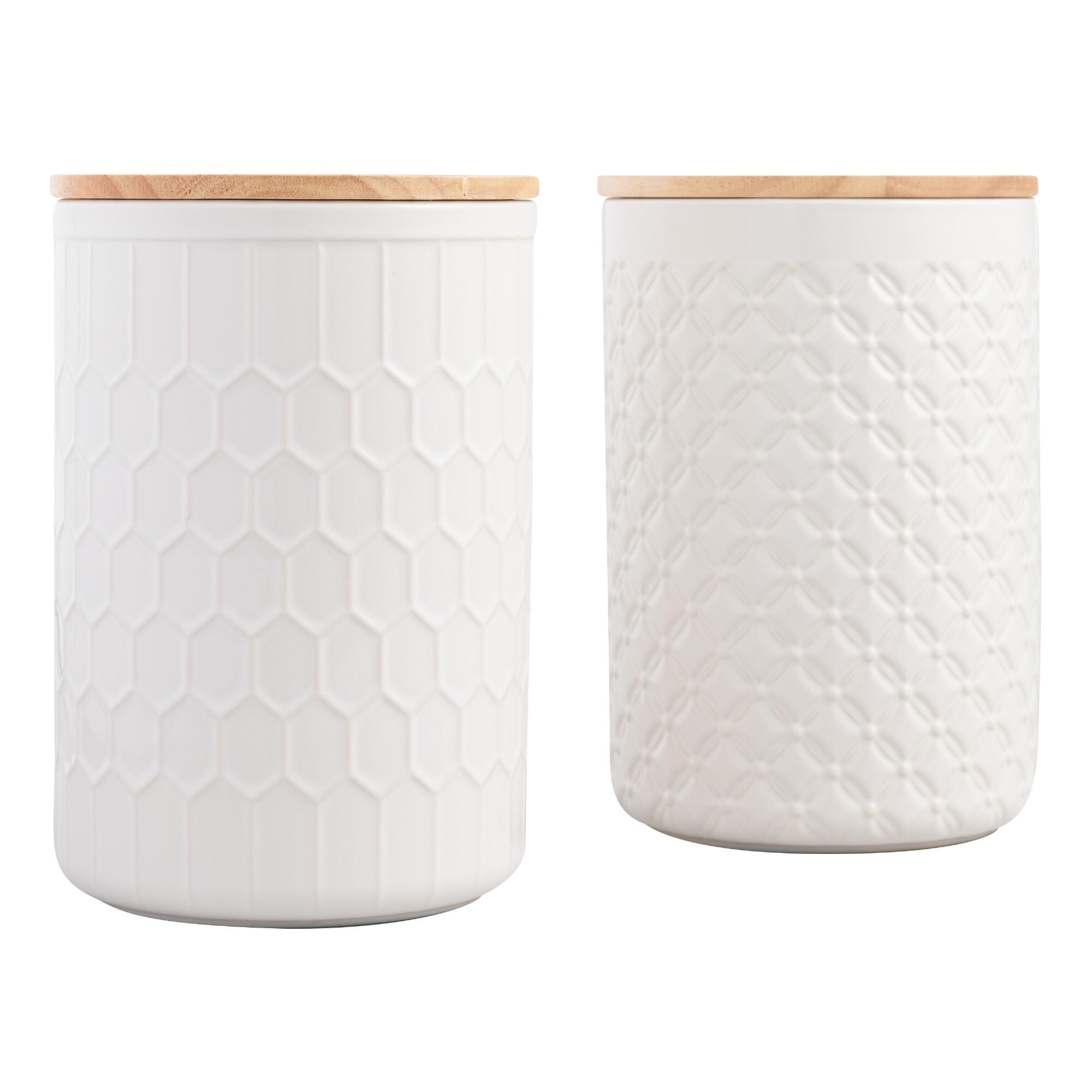 white textured canisters