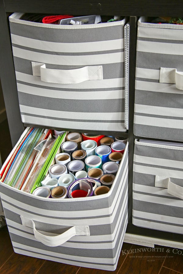 fabric bins holding craft supplies