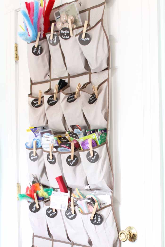 craft room organization can include everyday items like over the door shoe holders