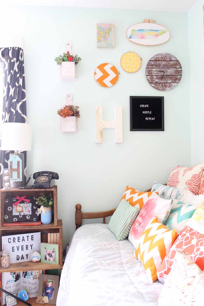 Craft room organization can include wall art