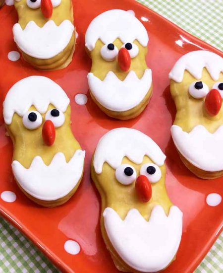 tray of cookies that look like chicks in eggs