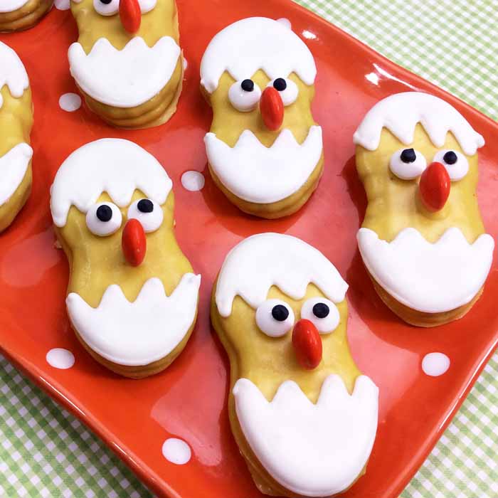 tray of cookies that look like chicks in eggs