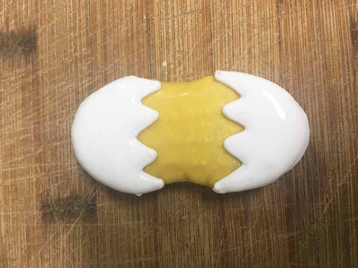 making an open egg on a nutter butter cookie