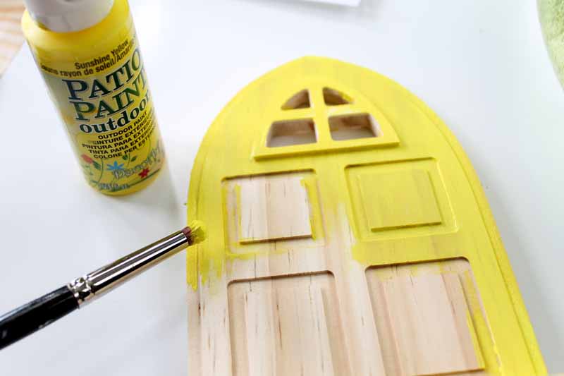 painting a wood door yellow