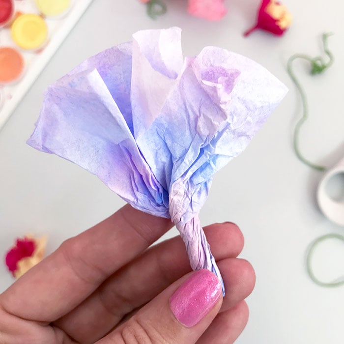 A single layered blue and purple coffee filter flower