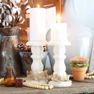 wooden candlesticks on a farmhouse mantel