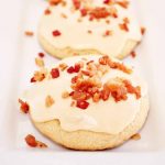 sugar cookies with caramel icing and bacon toppings