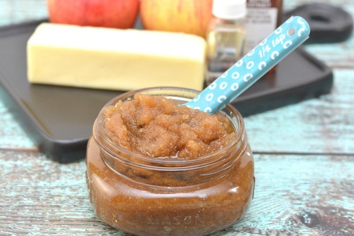 brown sugar scrub in a jar with a spoon