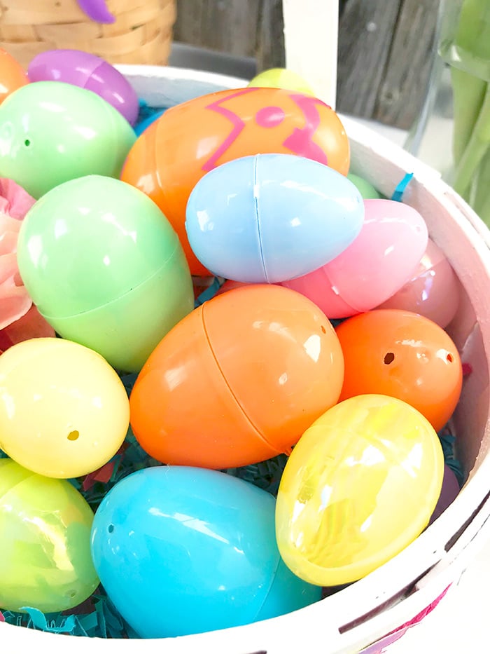 easter basket filled with plastic eggs