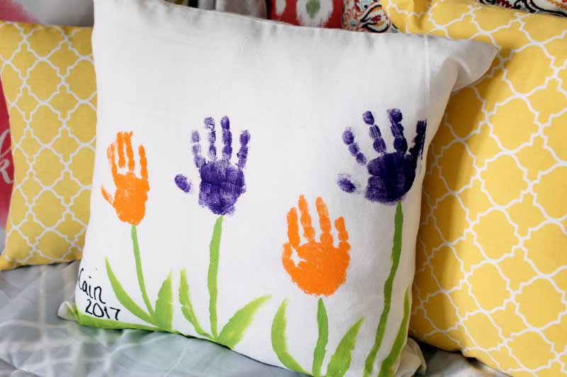 pillow cover with toddler handprints