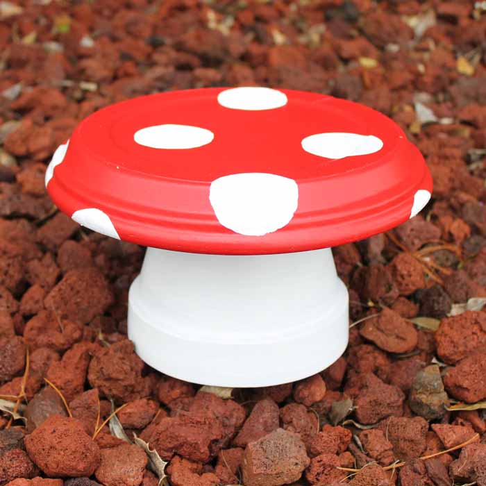 These clay pot mushrooms make cute garden decor and are so easy to make!