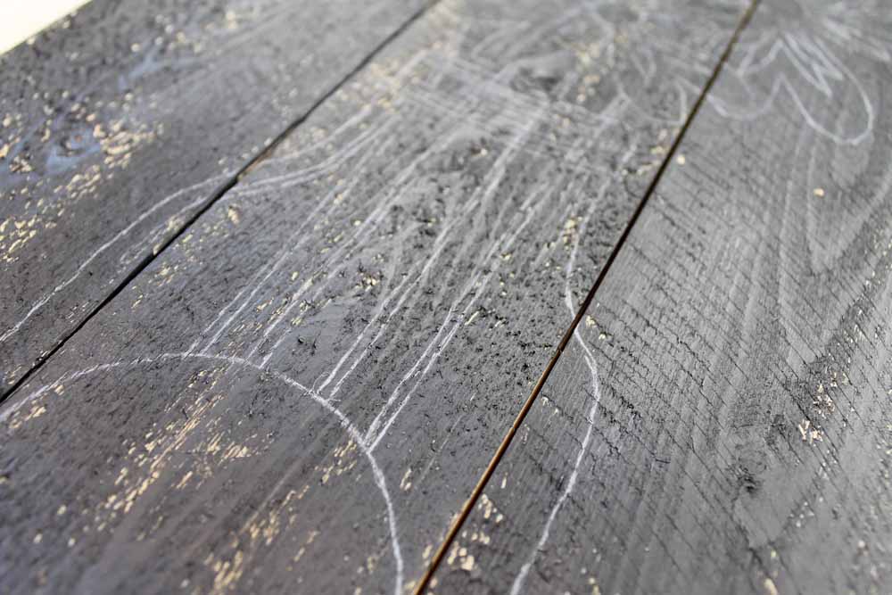 template transferred to a rustic sign for painted pallet art craft