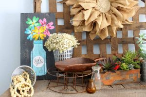 painted pallet art on a mantel