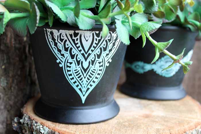 flower pot with chalk couture design on the front