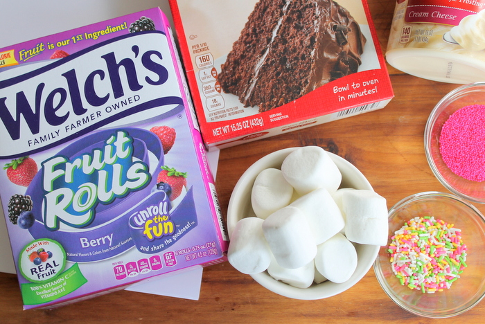 Ingredients for unicorn cupcakes: Welch's fruit rolls, cake mix, marshmallows, sprinkles, and frosting