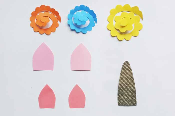 Create the flowers, ears, and horn for your unicorn party bags.