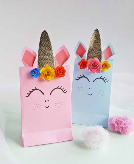 These unicorn party bags are perfect for birthdays and so much more! Get the free template and make your own in minutes!