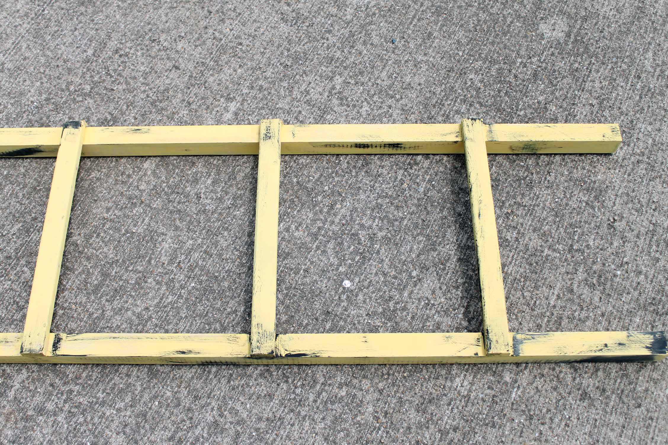 yellow wooden ladder