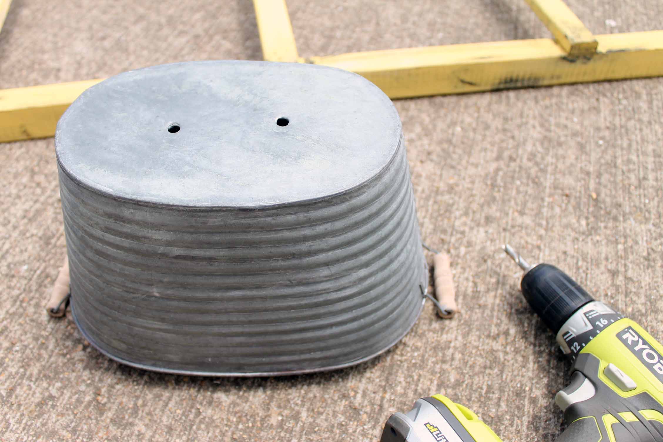 drilling holes in galvanized containers for drainage