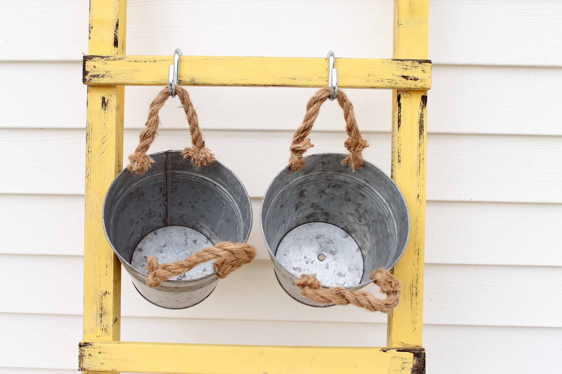 hanging planter pots from a ladder