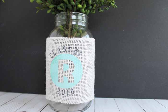 quart mason jar with burlap wrapped around it