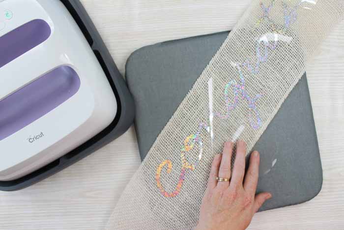 peeling back carrier sheet from holographic htv