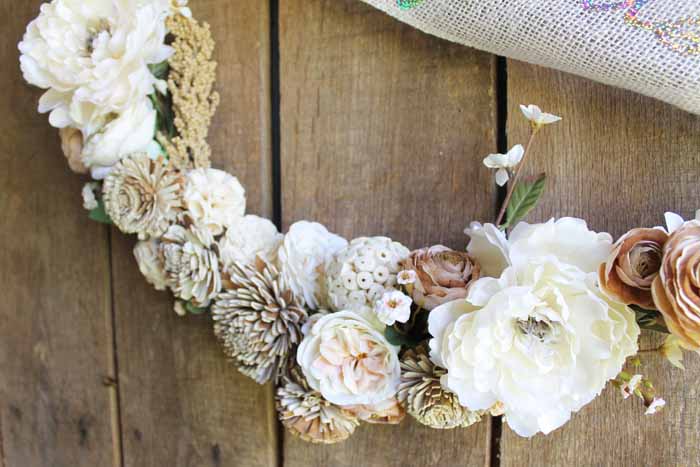 wooden flowers on a wreath