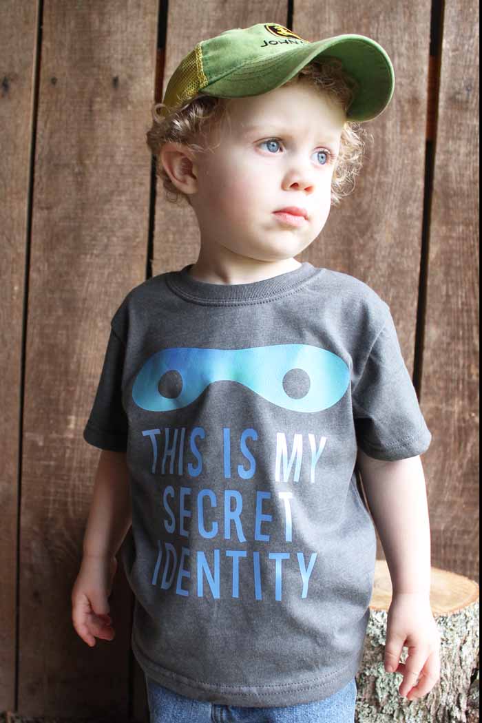 this is my secret identity iron on shirt on blue eyed little boy