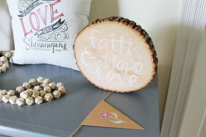 wood slice craft idea with cricut iron on designs