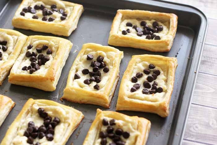 Baking a cream cheese danish. You will love the addition of chocolate chips!