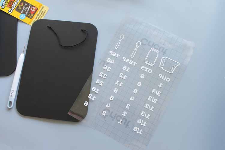 Cut vinyl to make a measurement conversion chart for your kitchen.