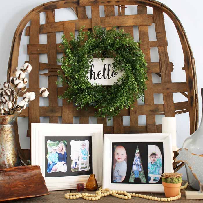 farmhouse style mantel with pictures