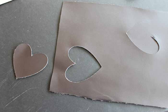leather with heart cut out on a table