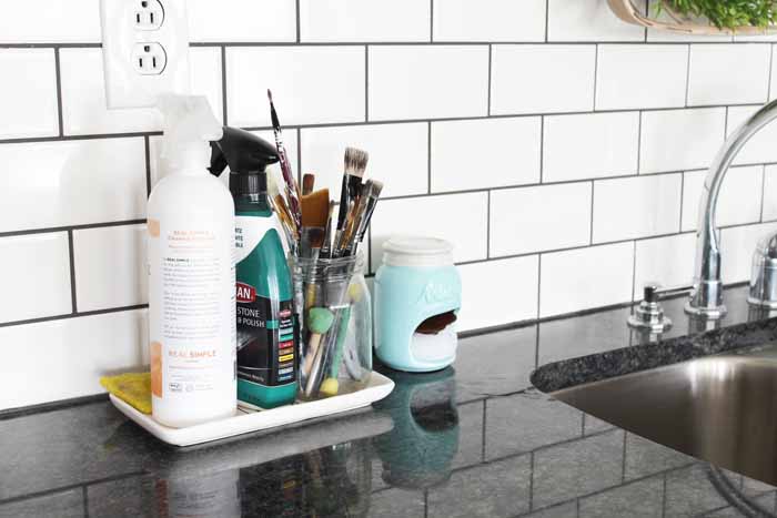 Sink area decor ideas in a farm kitchen.