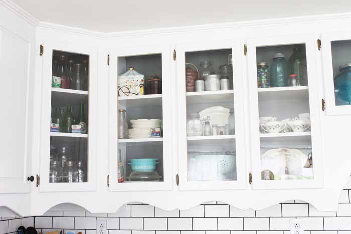 Upper cabinets in a farm kitchen.