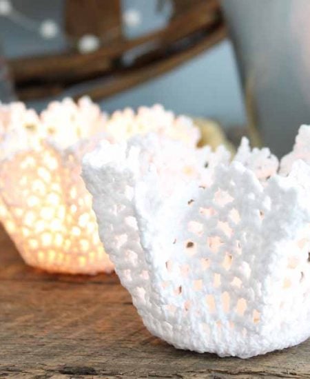 Learn how to stiffen fabric and make these doily candle holders that are perfect for weddings! A quick and easy DIY wedding idea!