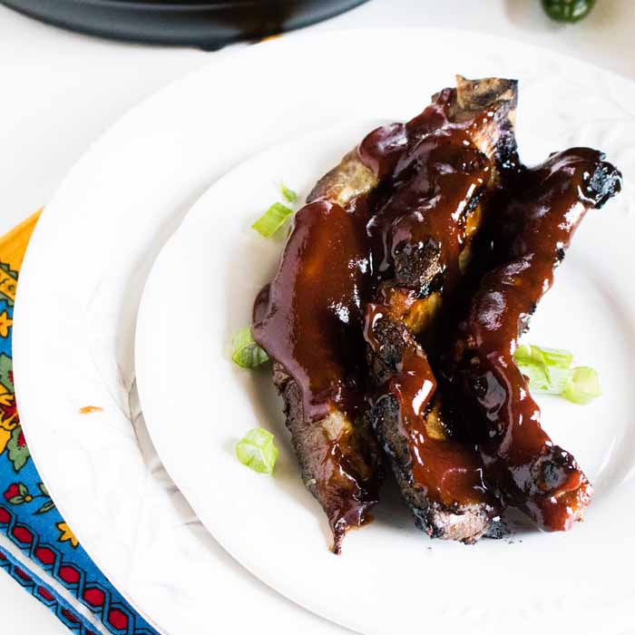 These instant pot ribs are perfect for any summer night! Get the recipe and whip these up in no time at all!