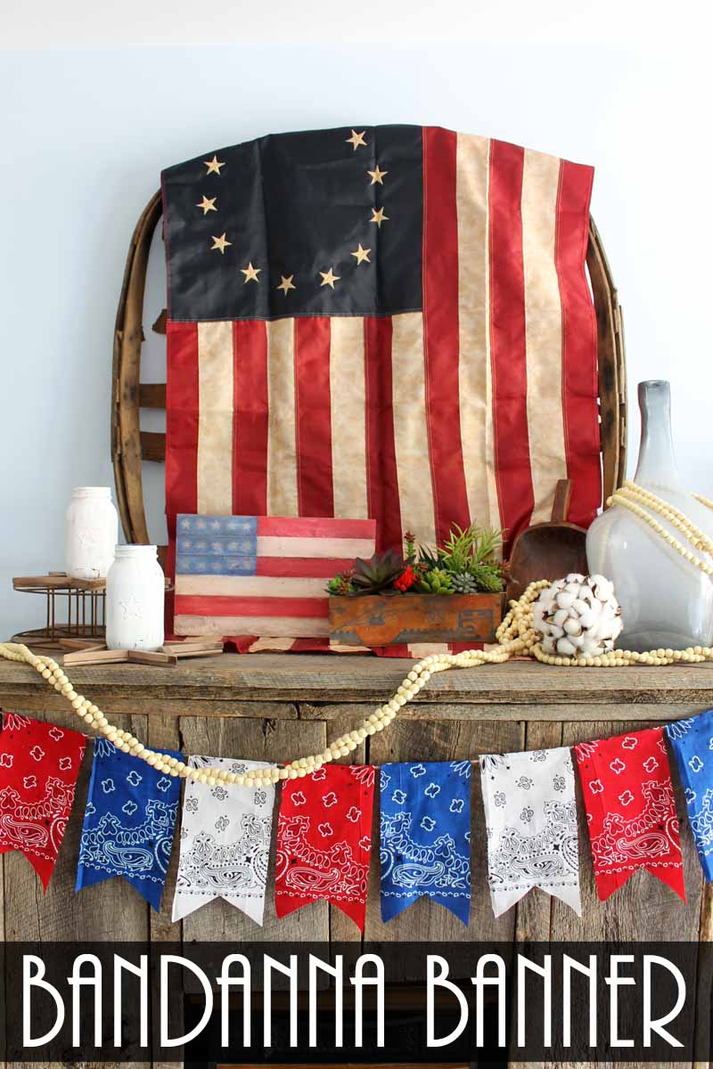 American Flag decor and patriotic themed table with red, white, and blue decorations