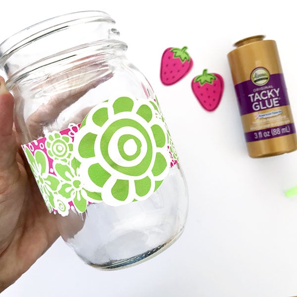 gluing decor on a mason jar