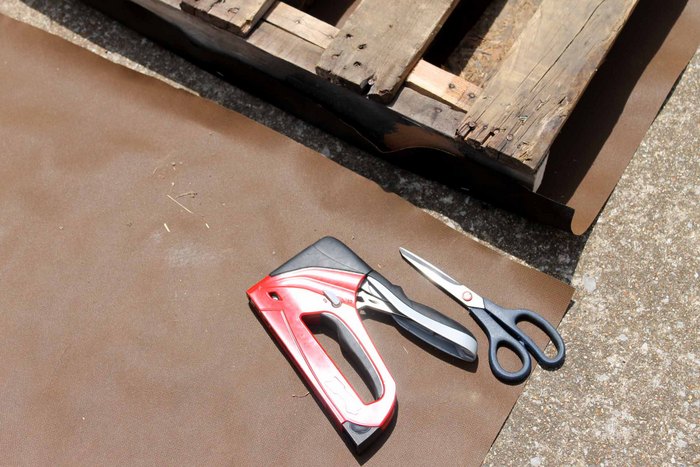 Adding landscape fabric to a pallet