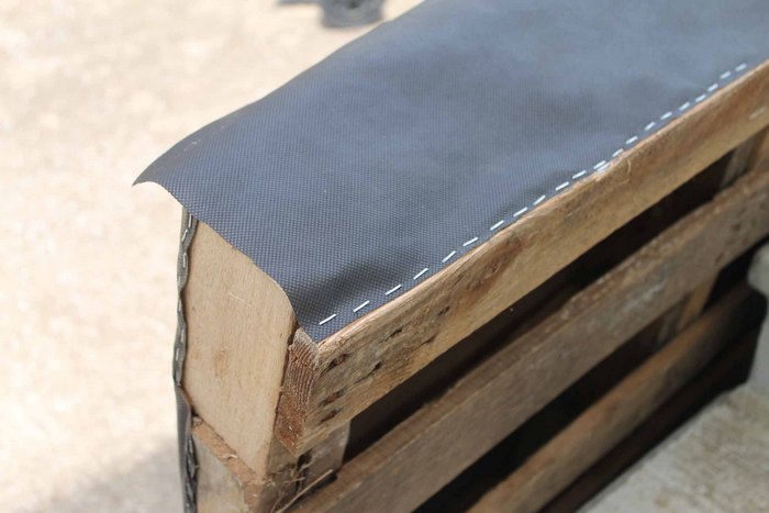 stapling landscaping fabric to a pallet