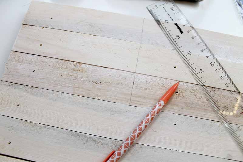 Drawing stars on a wooden flag
