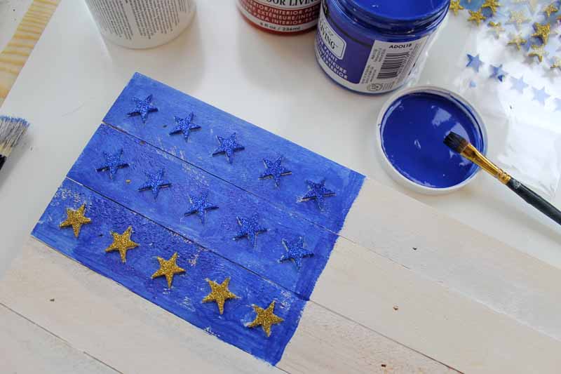 Masking for stars on a painted wooden flag