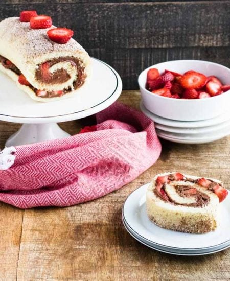 roll cake with chocolate and strawberries